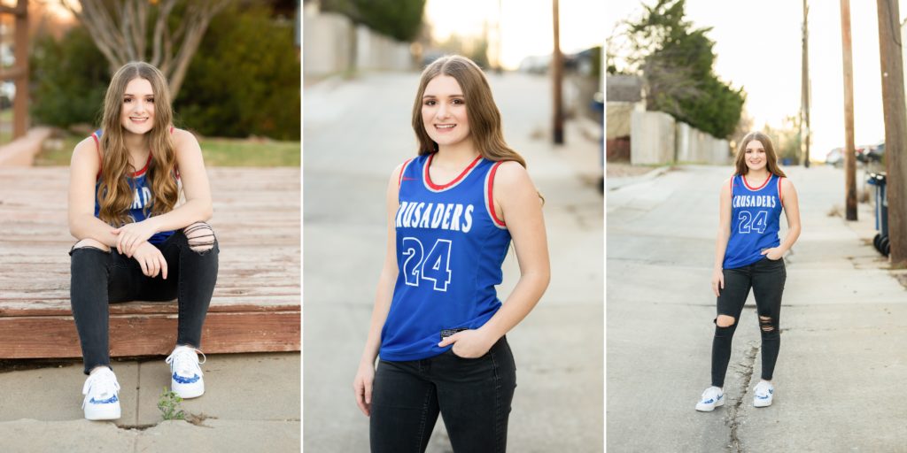 Senior girl posing in her basketball jersey for senior photos.