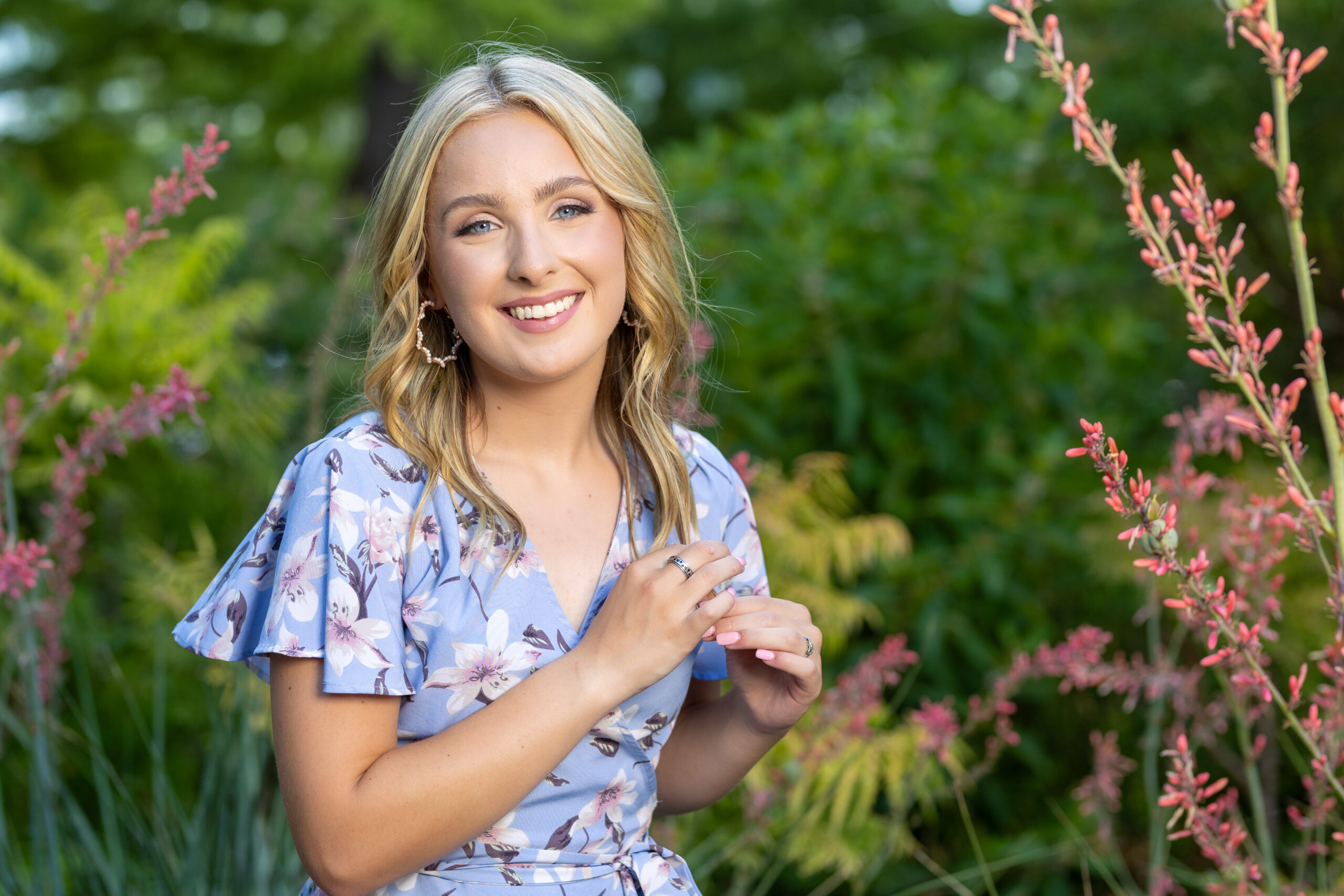 high school senior girl posing in the Myriad Gardens in OKC for her senior picture session